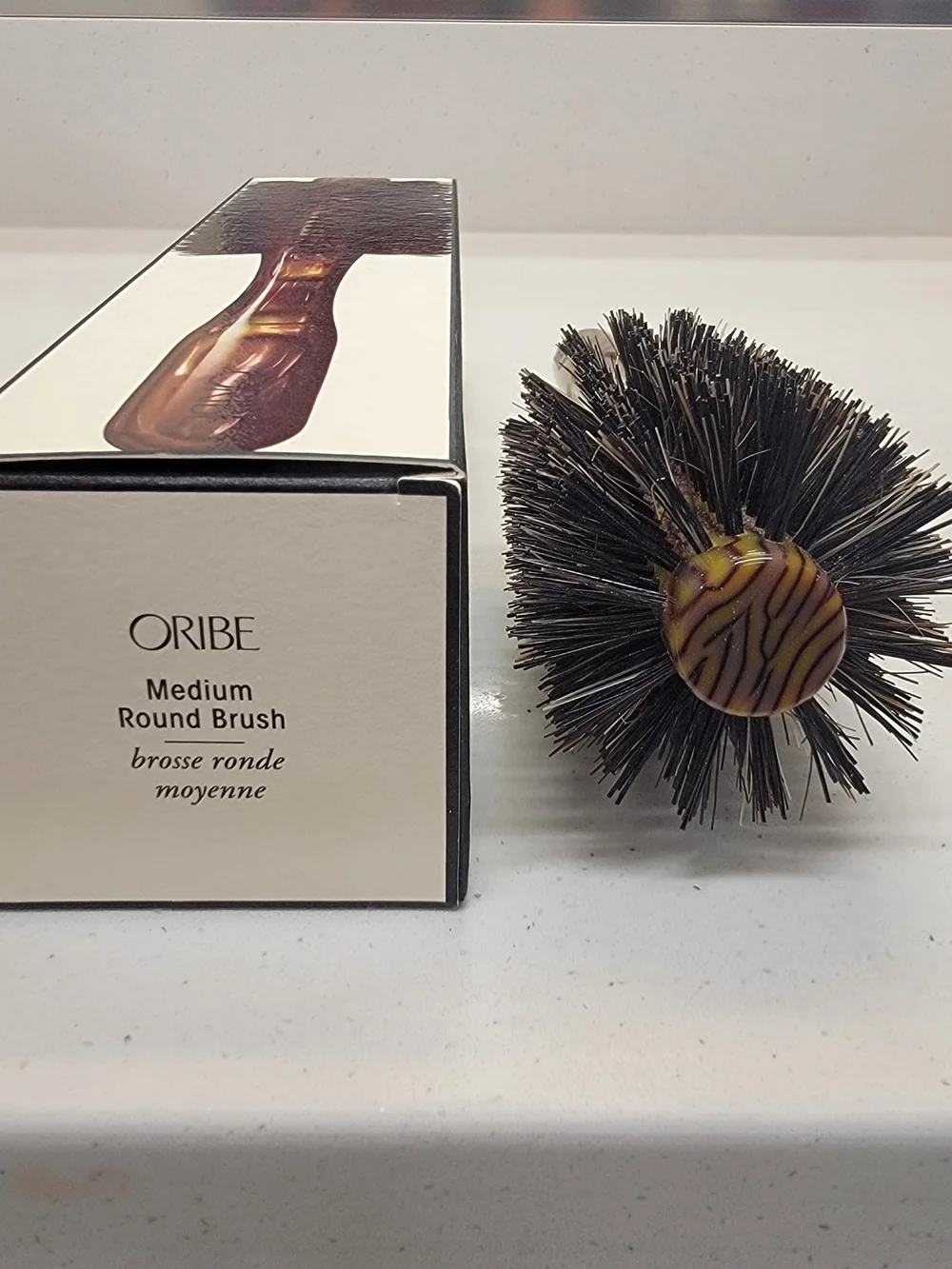 Oribe Round Styling Brush in Brown and Black